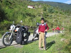 Small child next to the bike