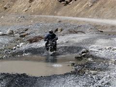 Bike through a small pool