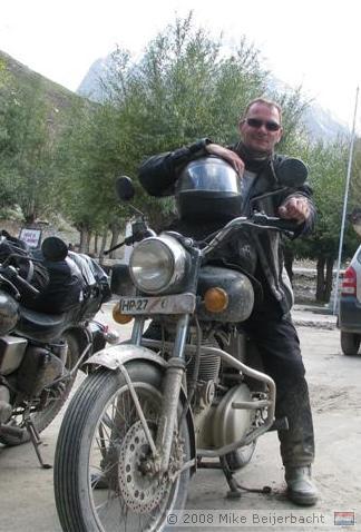 Mike on his bike, taking a break at a gasstation